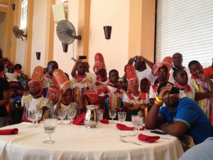 5.4 Montserratian masqueraders watch Guadeloupean masqueraders